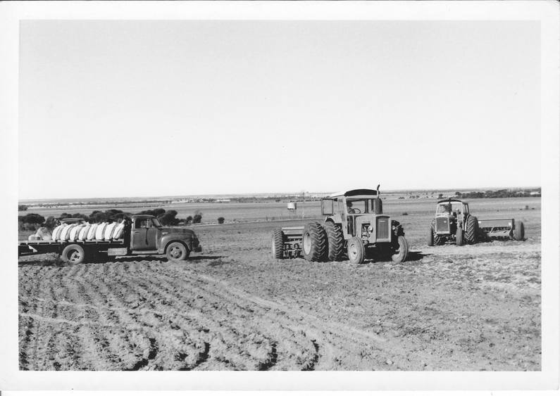 Dunne collection 1960's seeding with Chamberlain354 towing Massey Harris seeder and Countryman6 towing International cultitrash. Chev truck